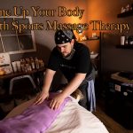 massage-therapist-applying-heat-pad-to-back-of-sports-massage-client