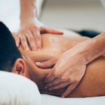 Man-getting-a-massage-on-his-back