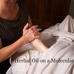massage-therapist-applying-herbal-oil-on-clients-foot