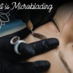 microblading gloved hand on eyebrow