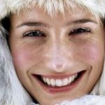 winter woman fur hat smiling